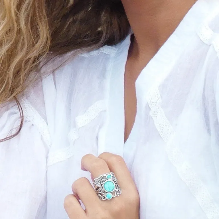 Shine Bright: Explore Our Stunning Silver Ring set with a blue lab opal.